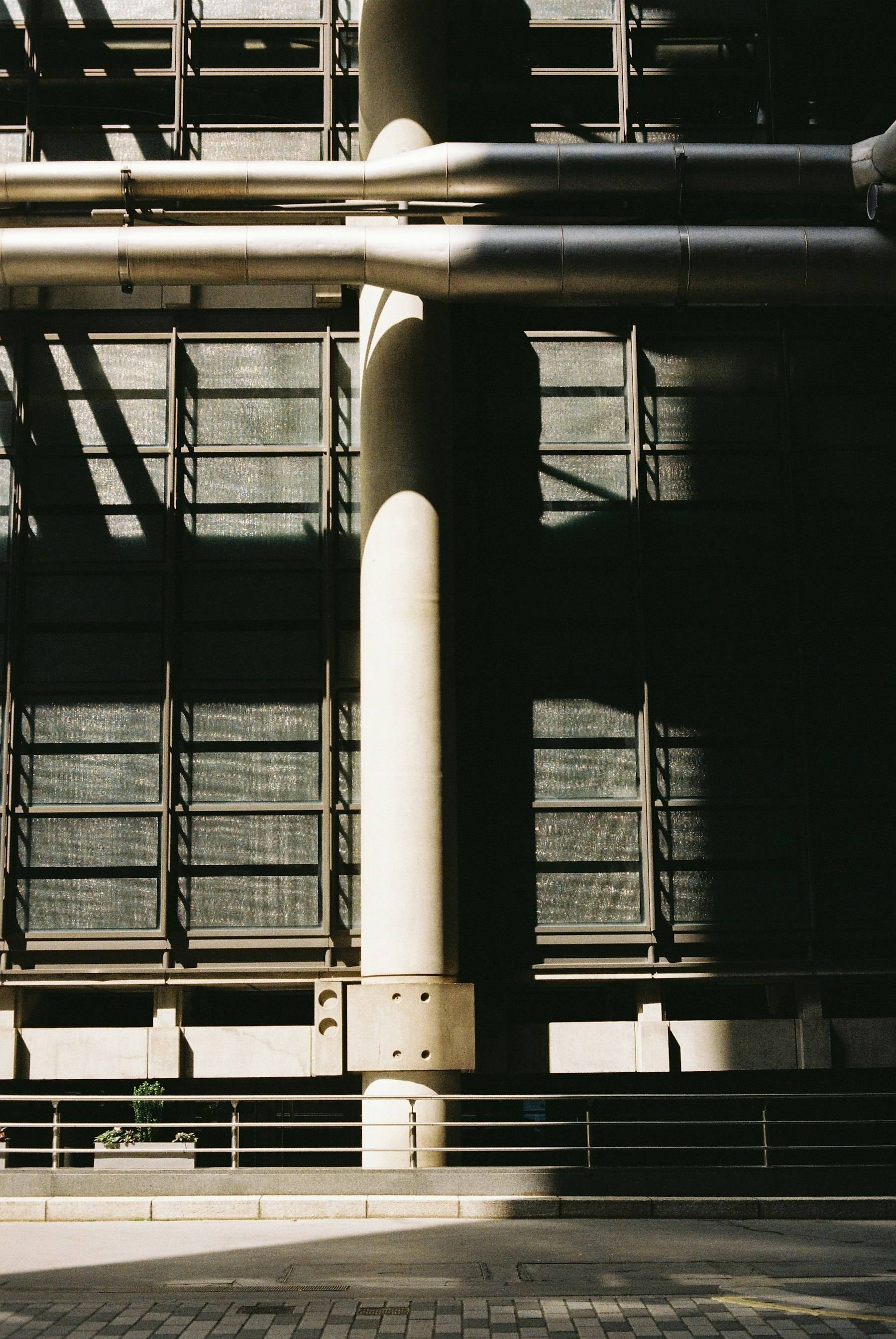 Industrial building facade with strong geometric shadows