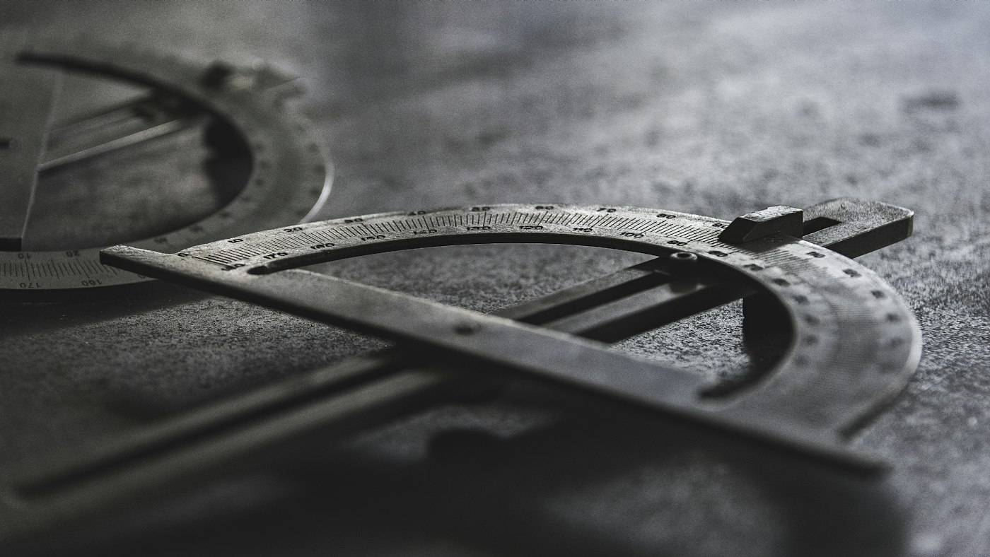 Precision measuring instruments resting on a workbench